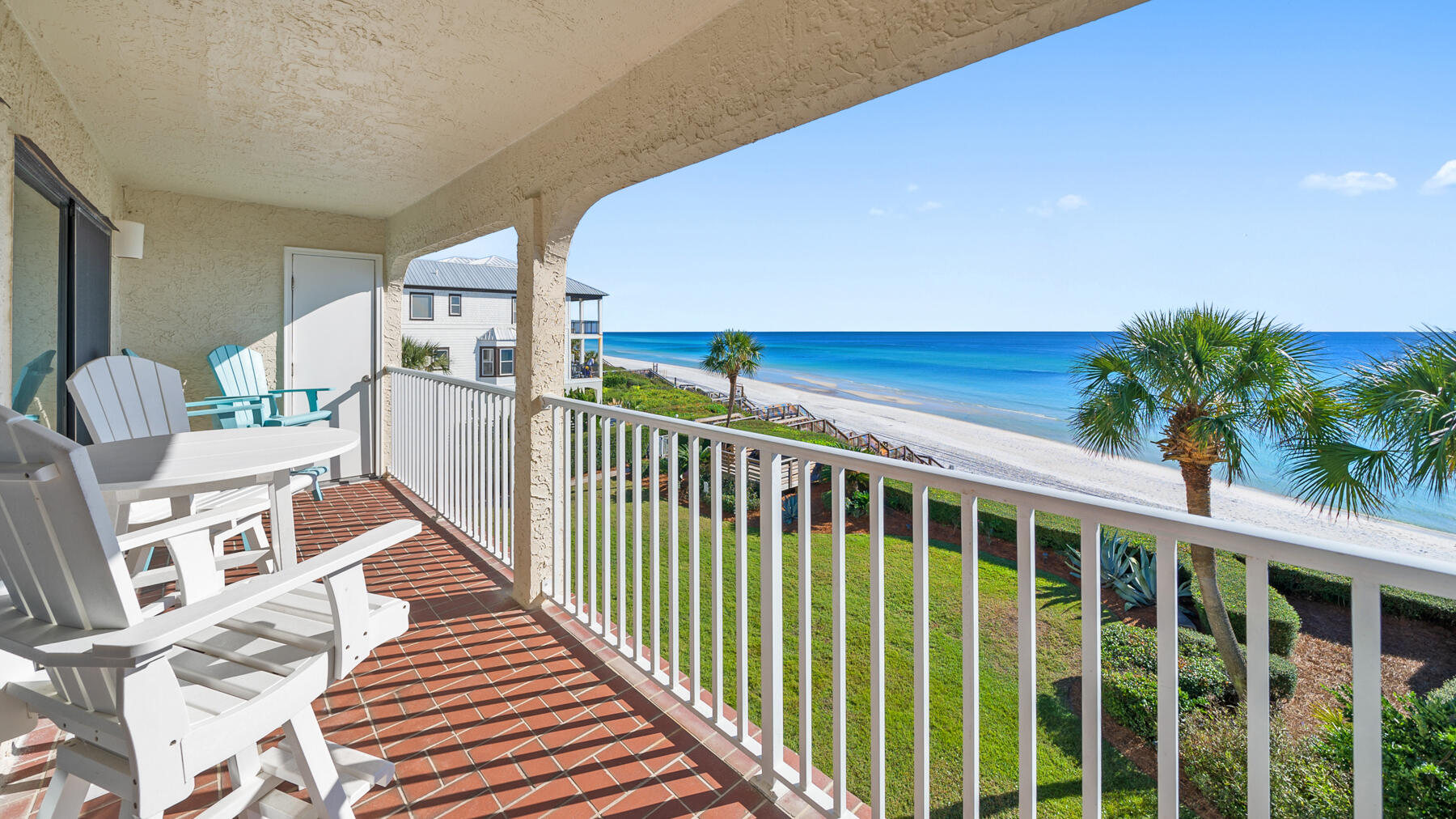 a view of a balcony with wooden floor