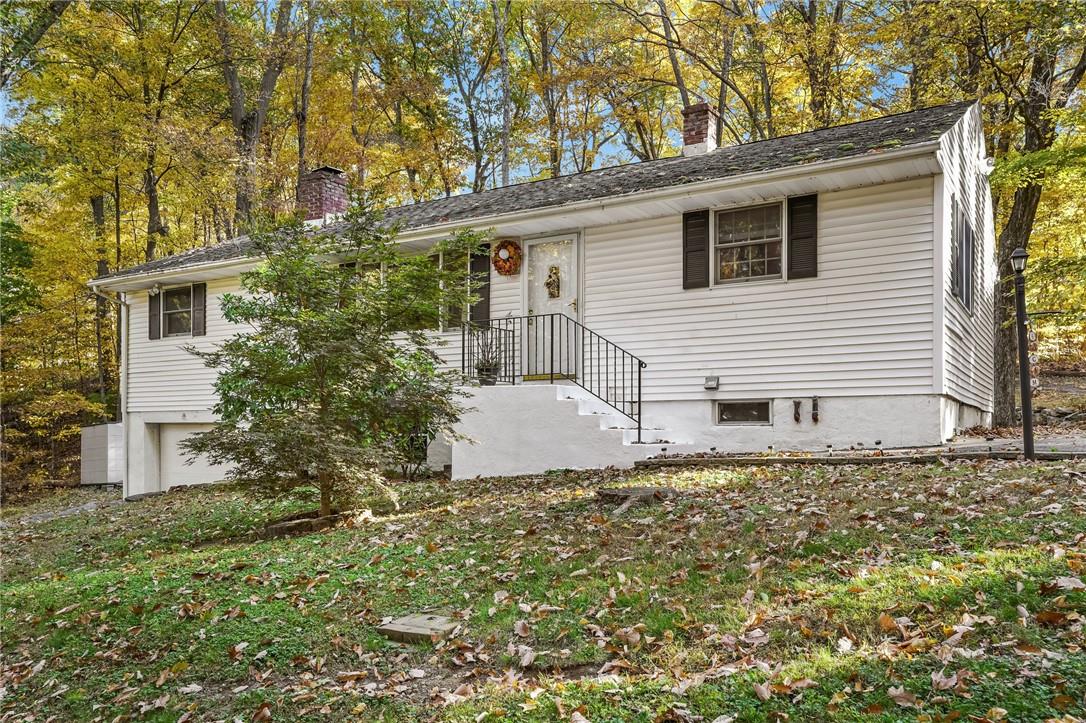 Single story home with a garage