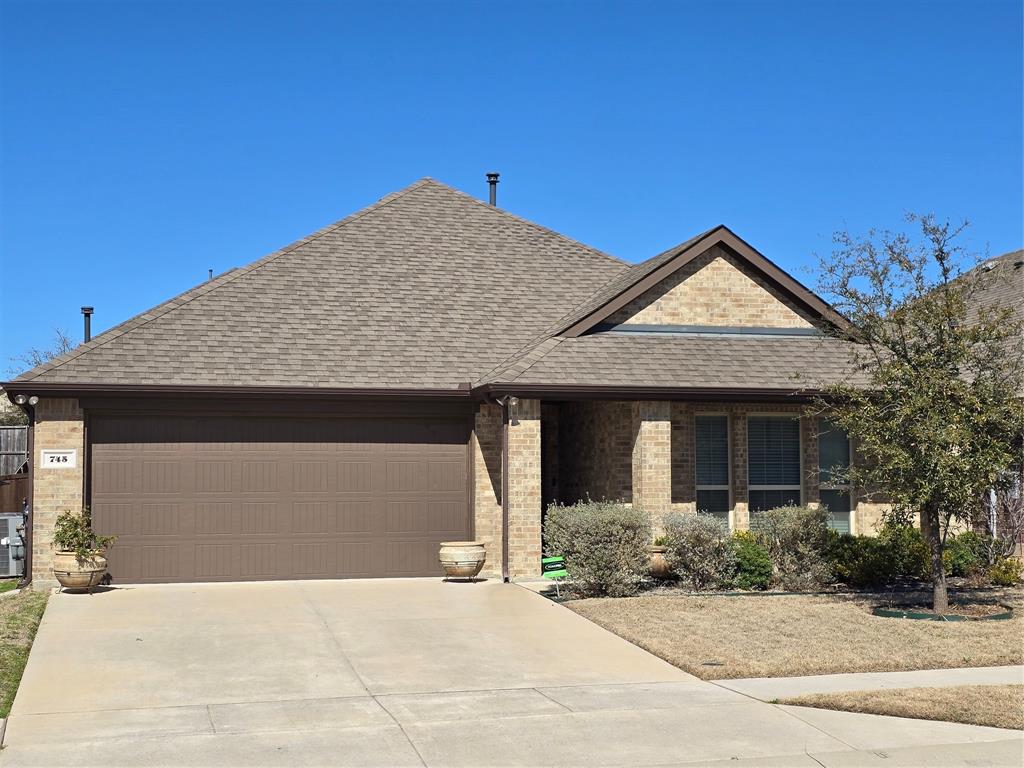 front view of a house with yard