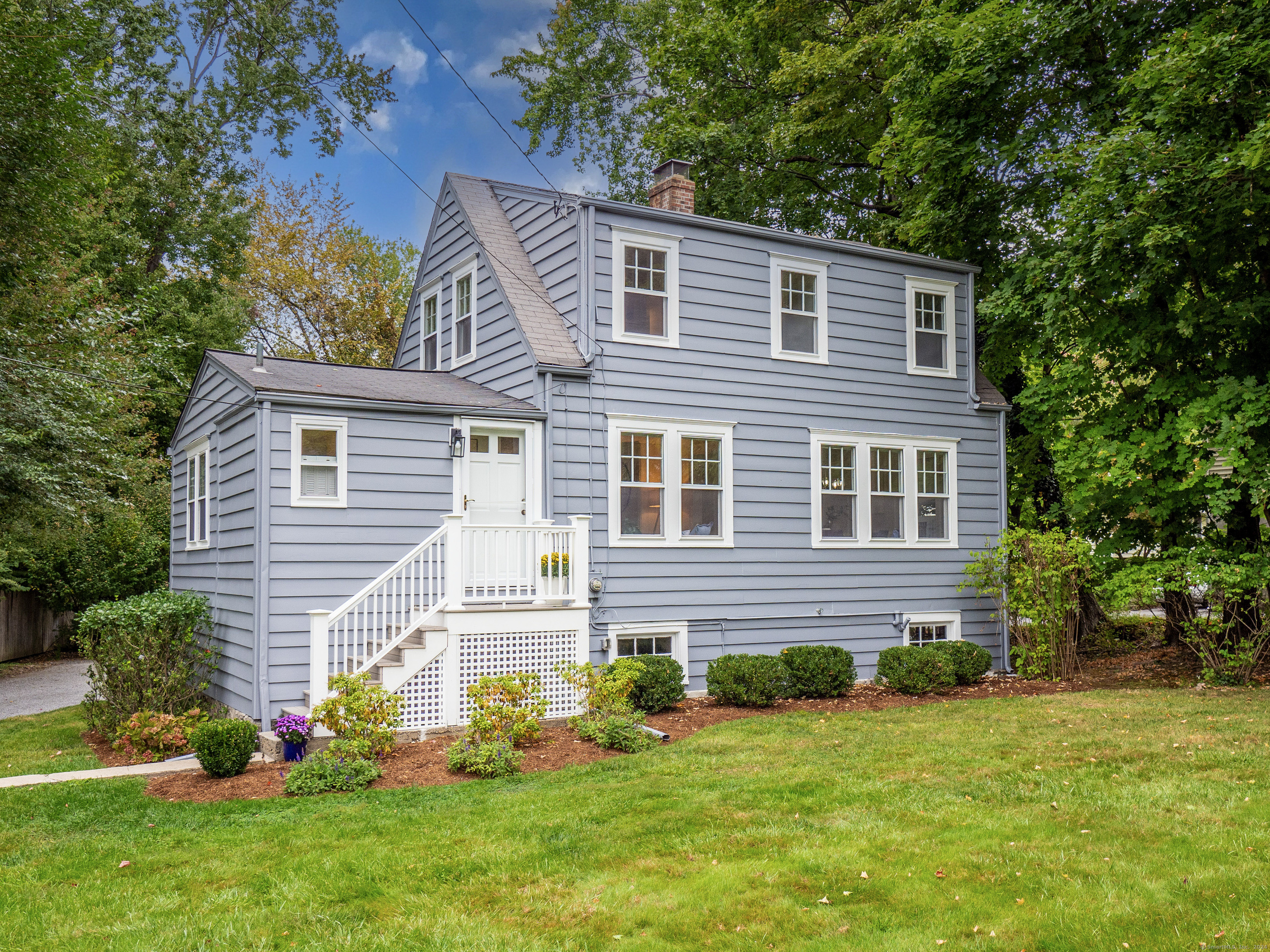 a front view of house with yard