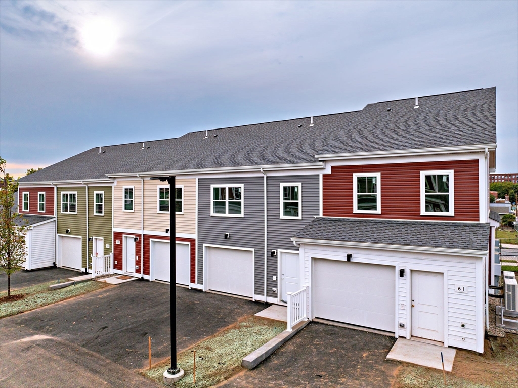 a front view of a house with a garage