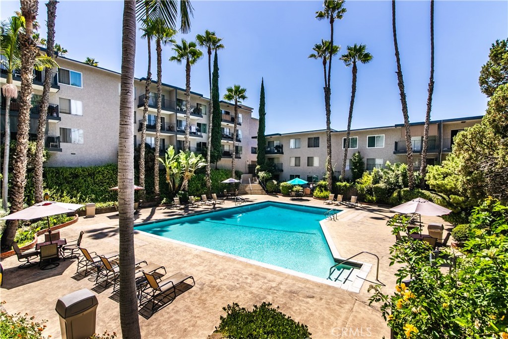 a view of a swimming pool with a patio