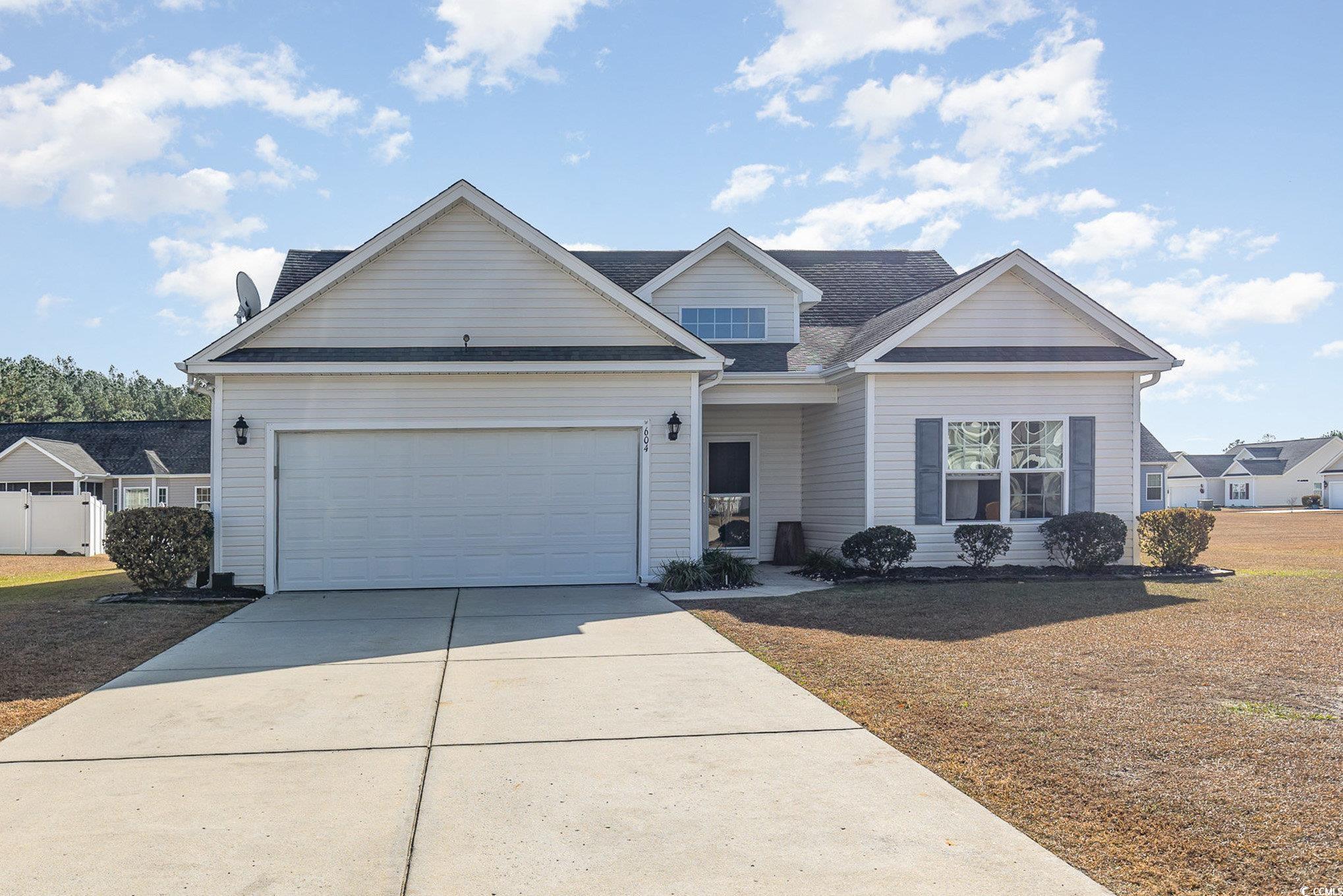 View of front facade with a garage