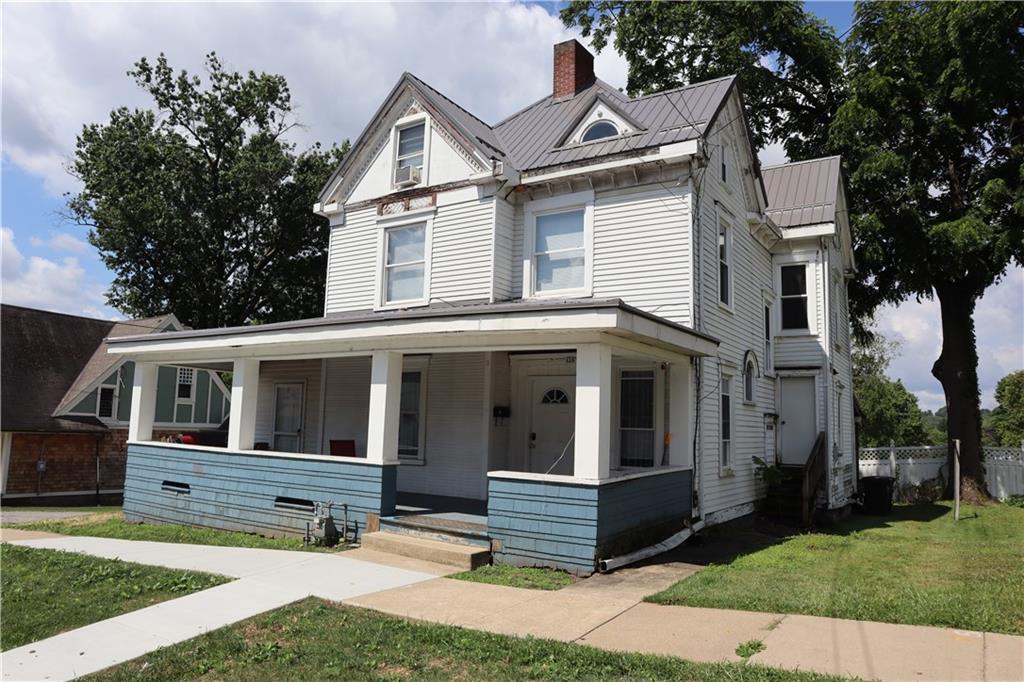 a view of outdoor space yard and front view of a house