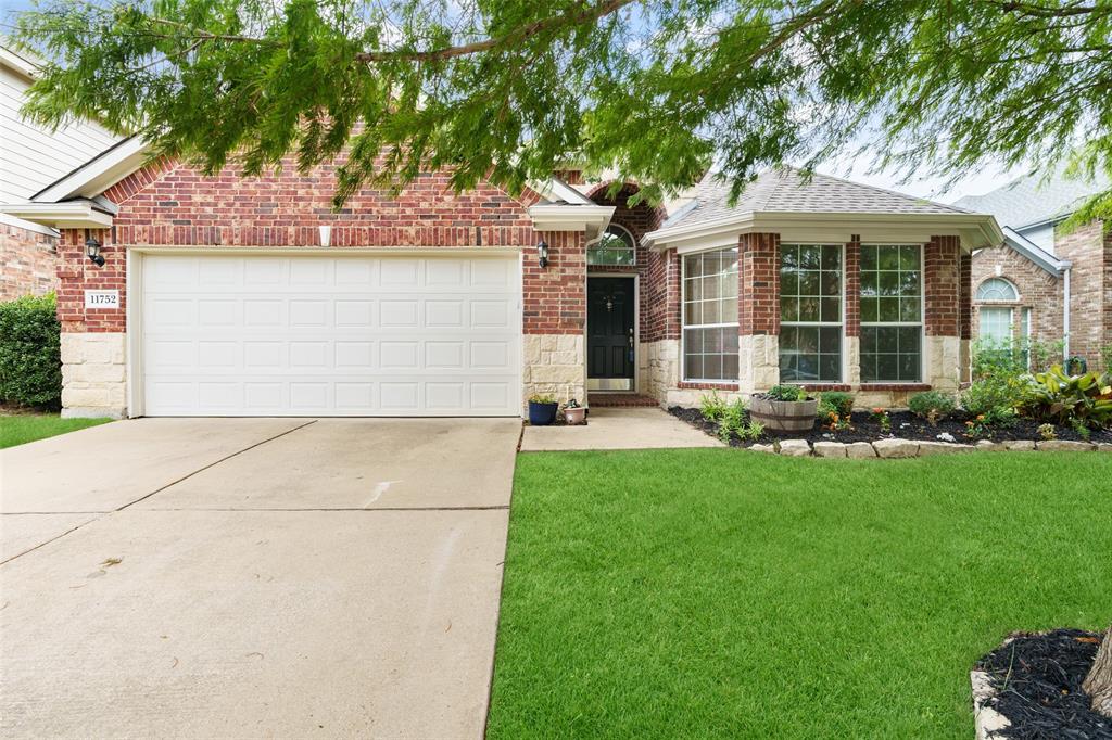 front view of house with a yard