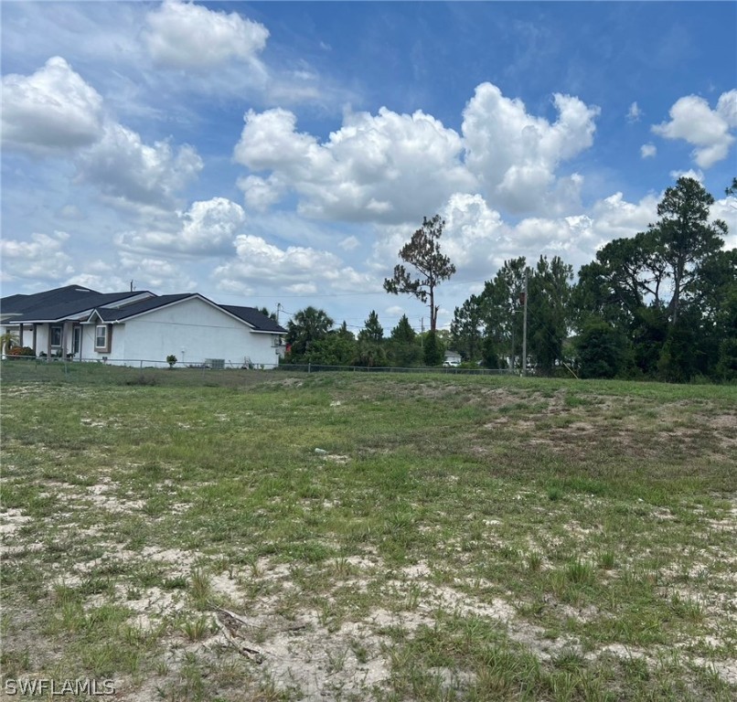 a view of a house with a big yard