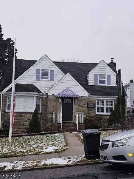 a front view of a house with porch