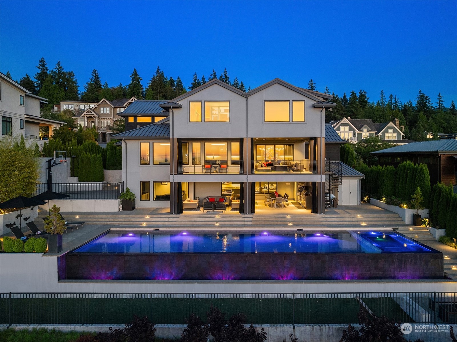 a front view of house with yard and outdoor seating