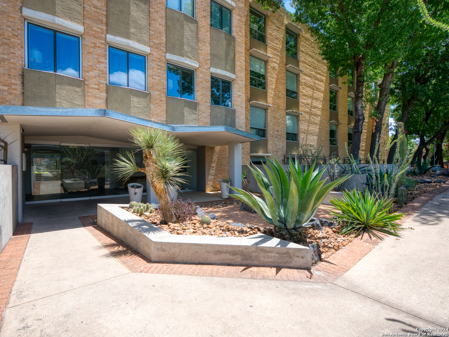 a view of a building with a patio