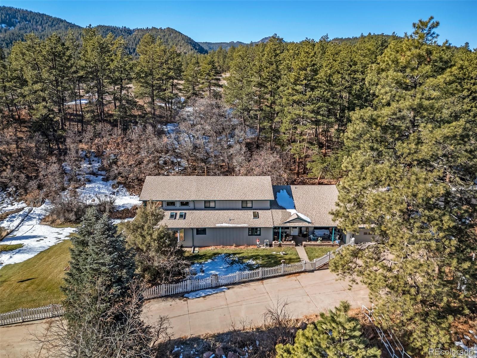 a view of a houses with a mountain