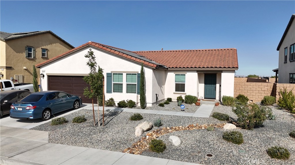 a front view of a house with a patio