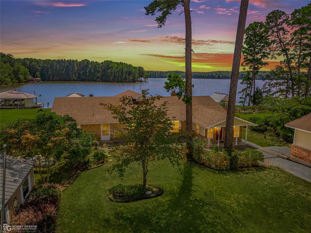 a view of a lake with a garden