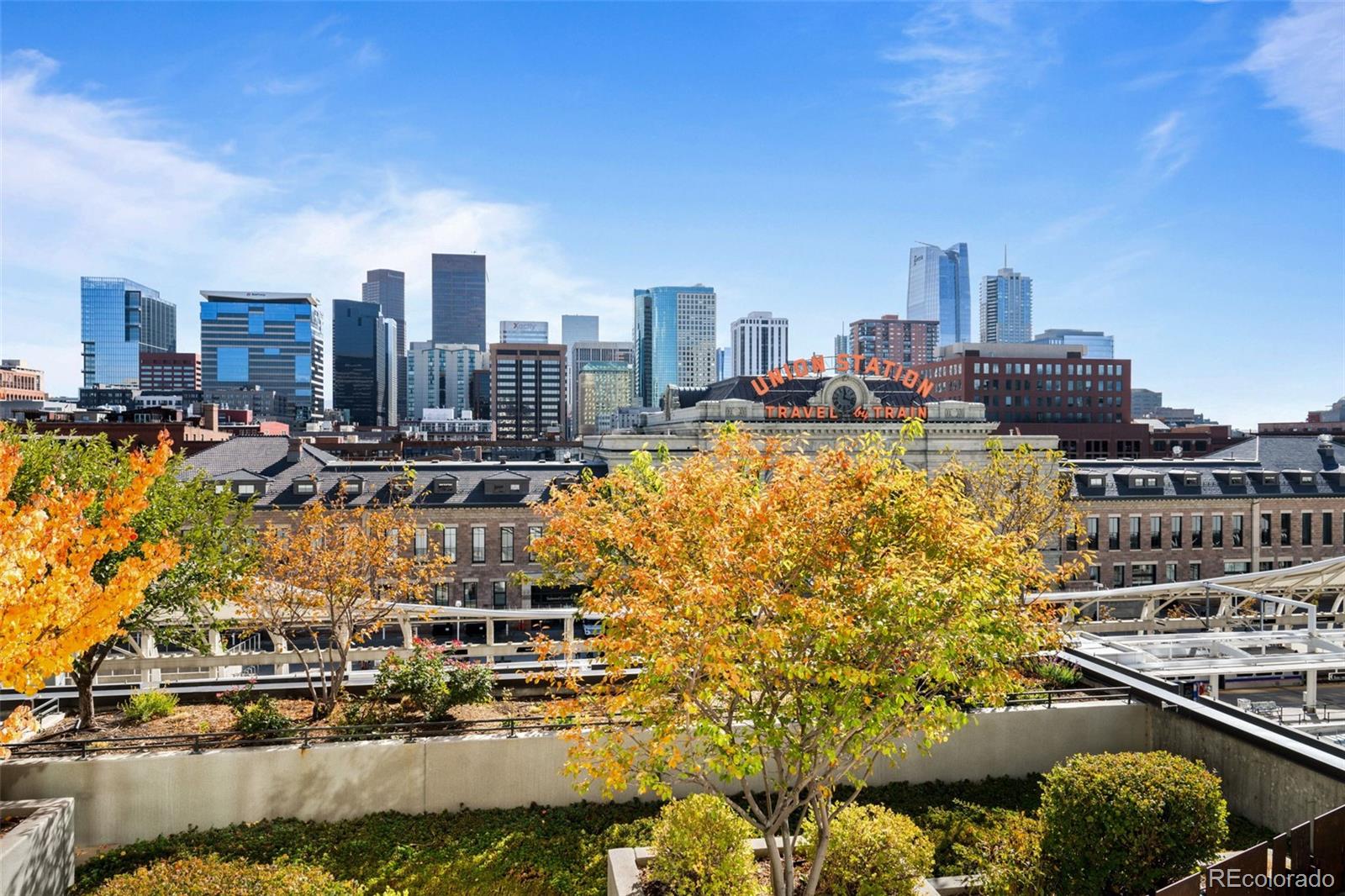 a view of a city with tall buildings