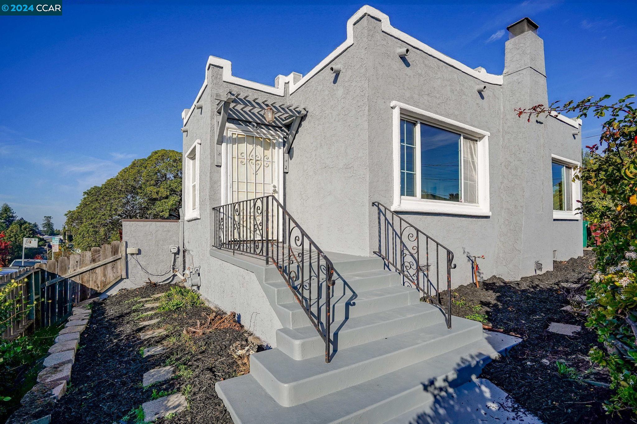 a view of a house with wooden stairs