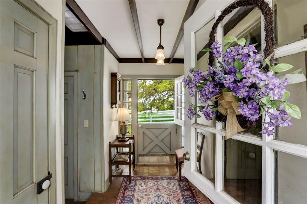 a view of front door and dining room