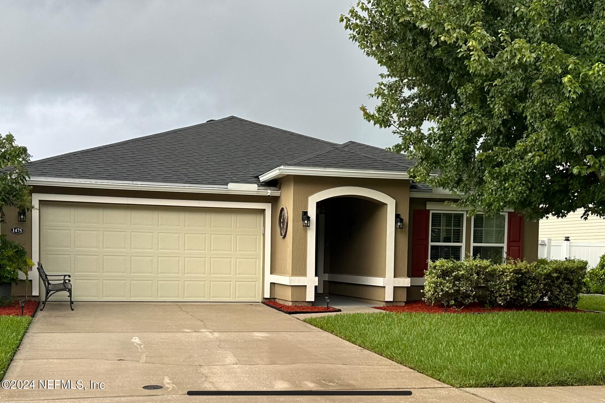 a front view of house with yard