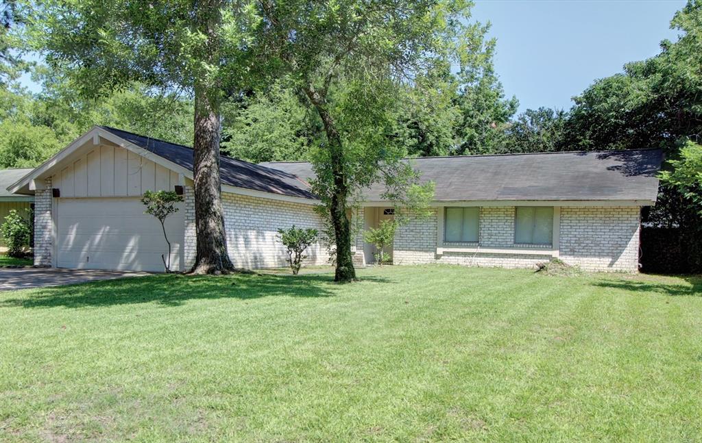 a view of a house with a garden