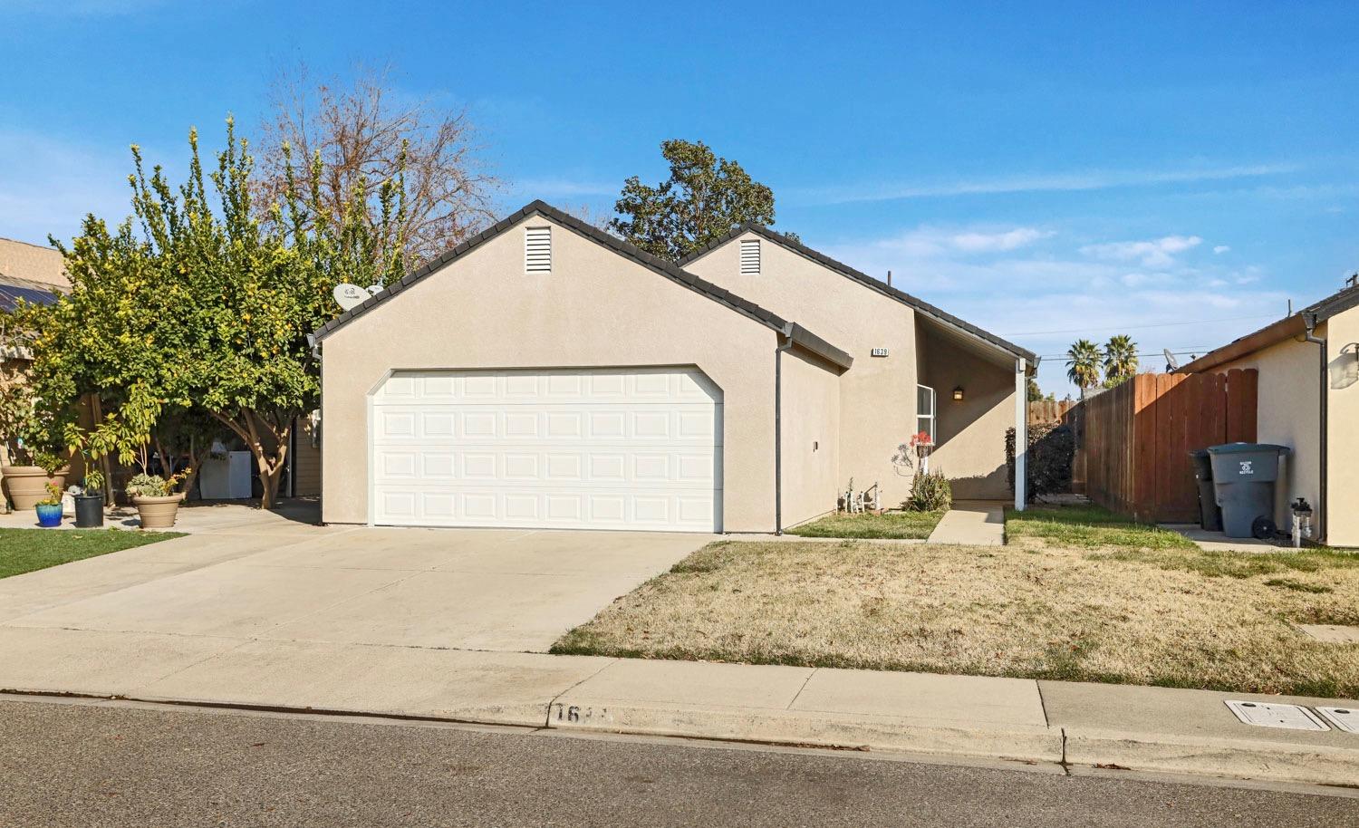 a view of a house with a garage