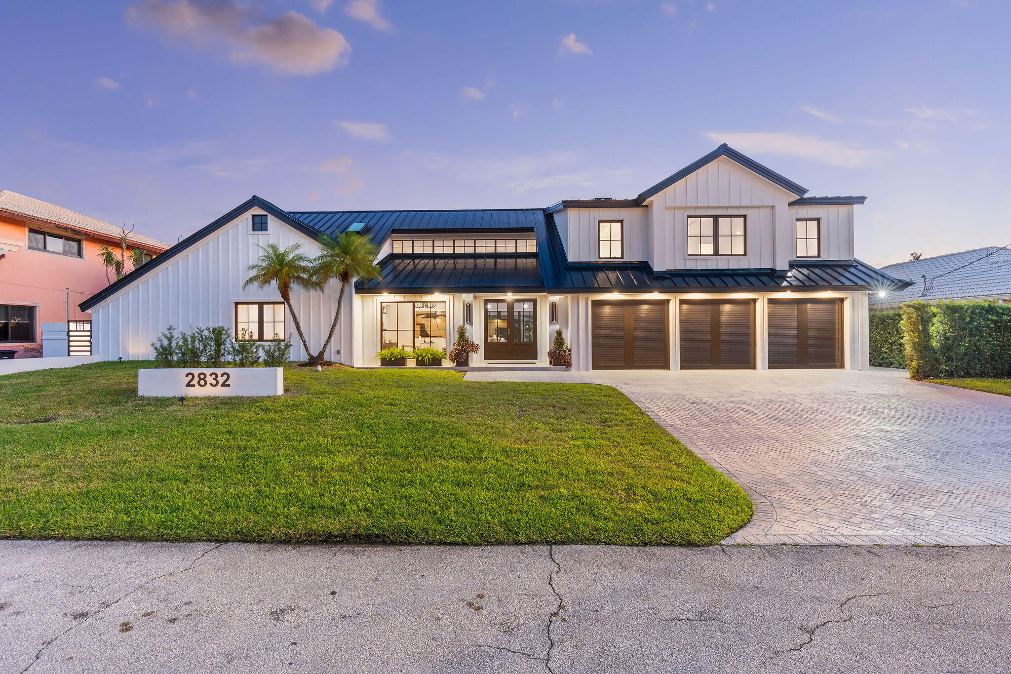 front view of a house with a yard