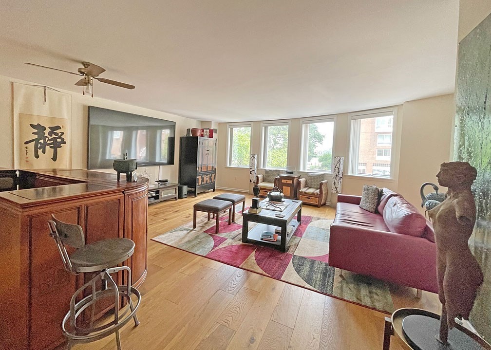 a living room with furniture and a window