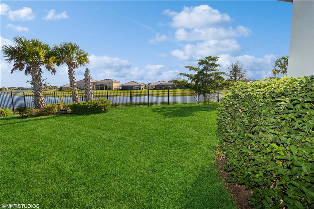 a view of a golf course with a lake