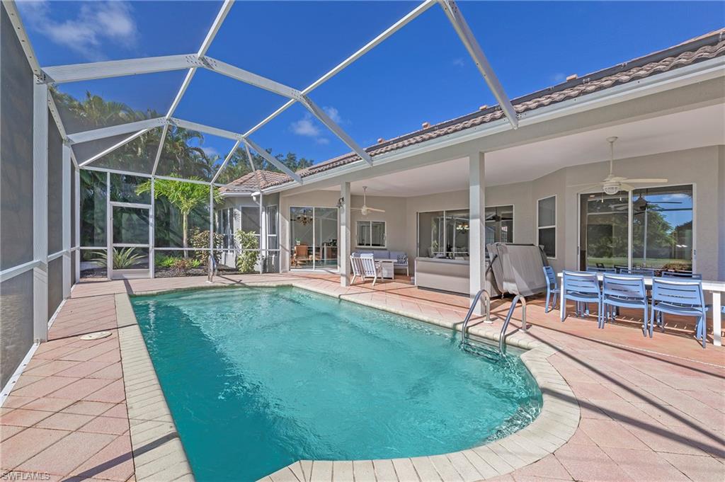 a view of a backyard with sitting area