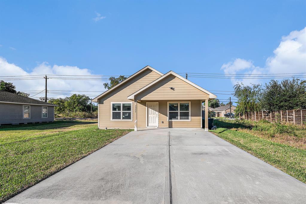 a front view of a house with yard