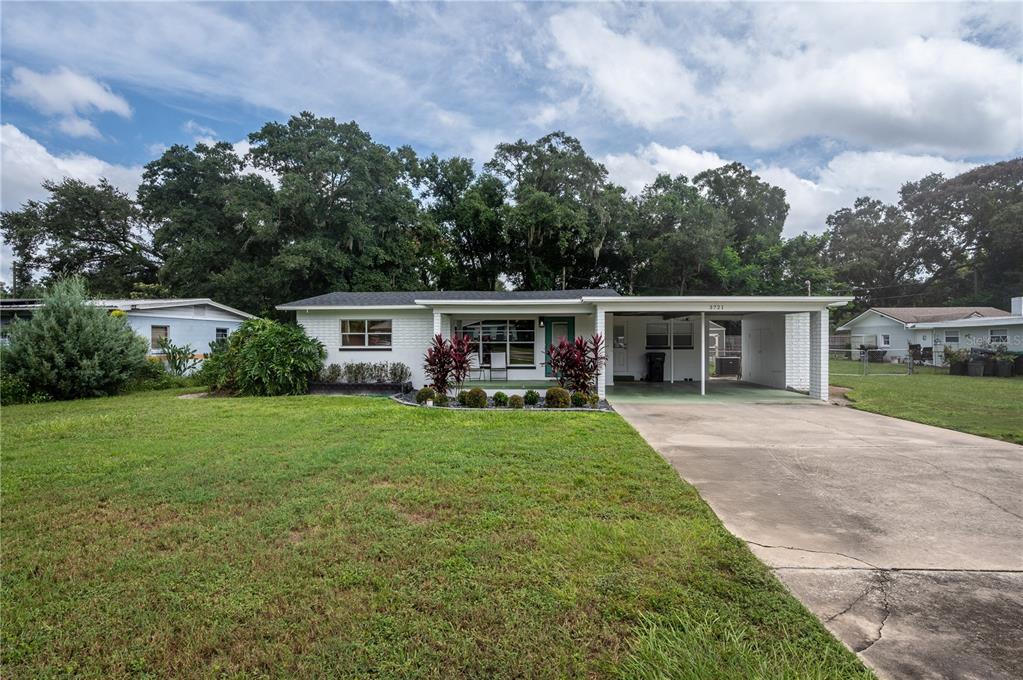 front view of a house with a yard