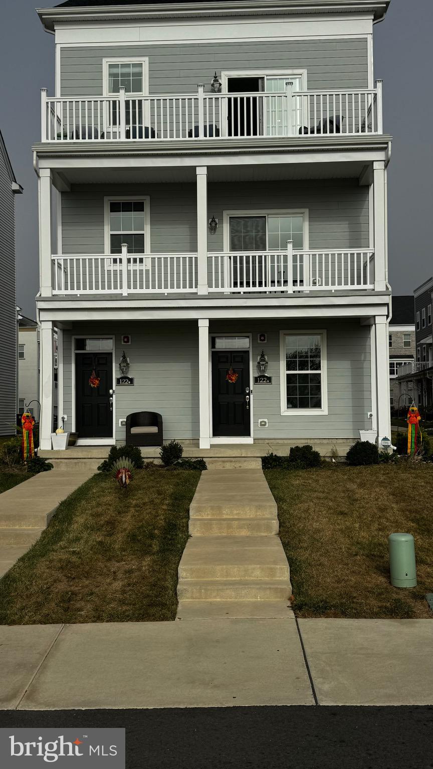 a front view of a house with barbeque area