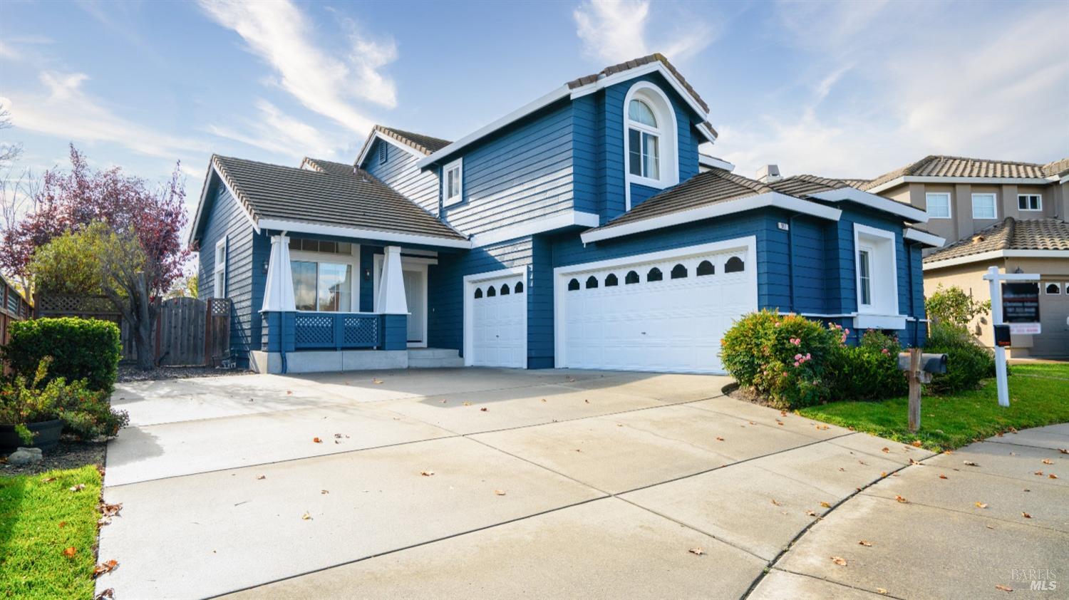 Front view with 3-car garage showing