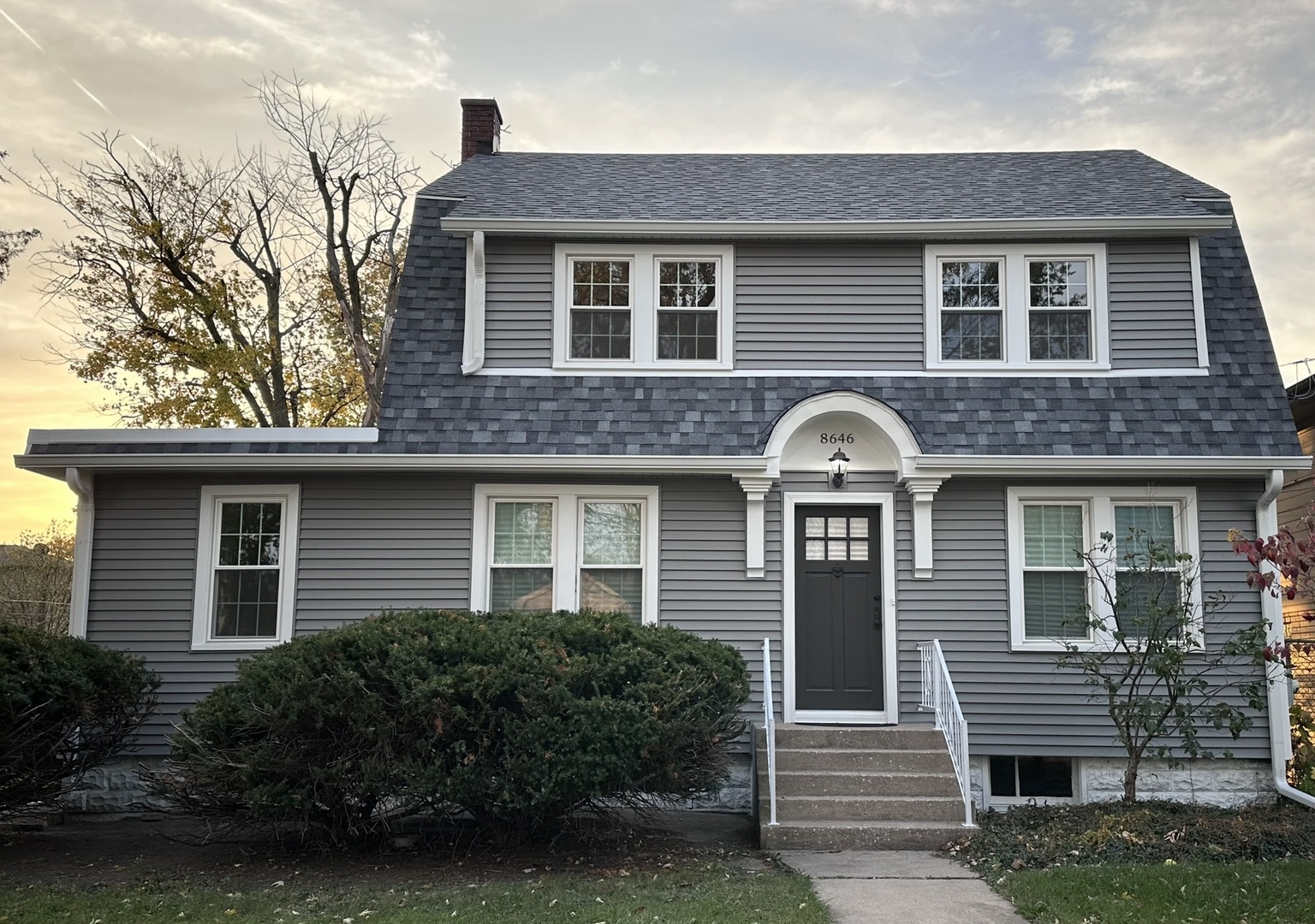 a front view of a house with balcony