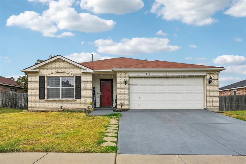 a front view of a house with yard