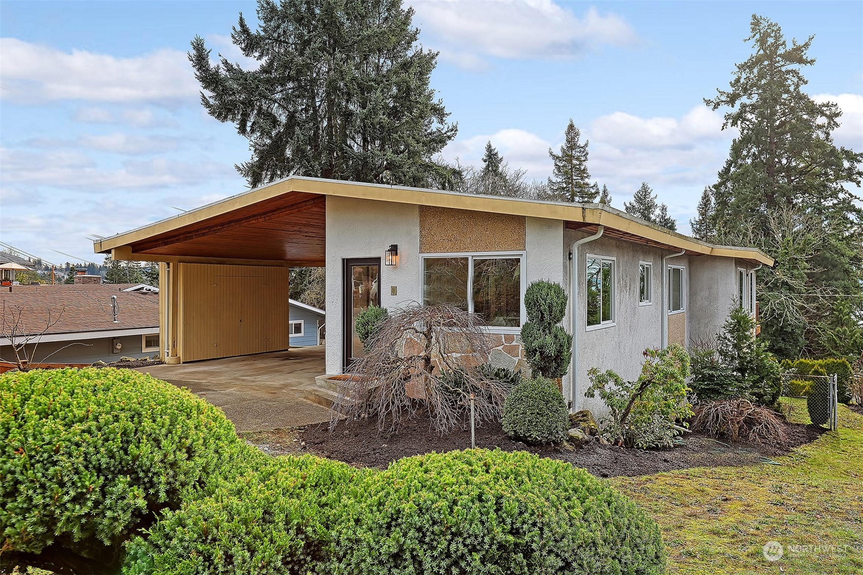 front view of a house with a yard