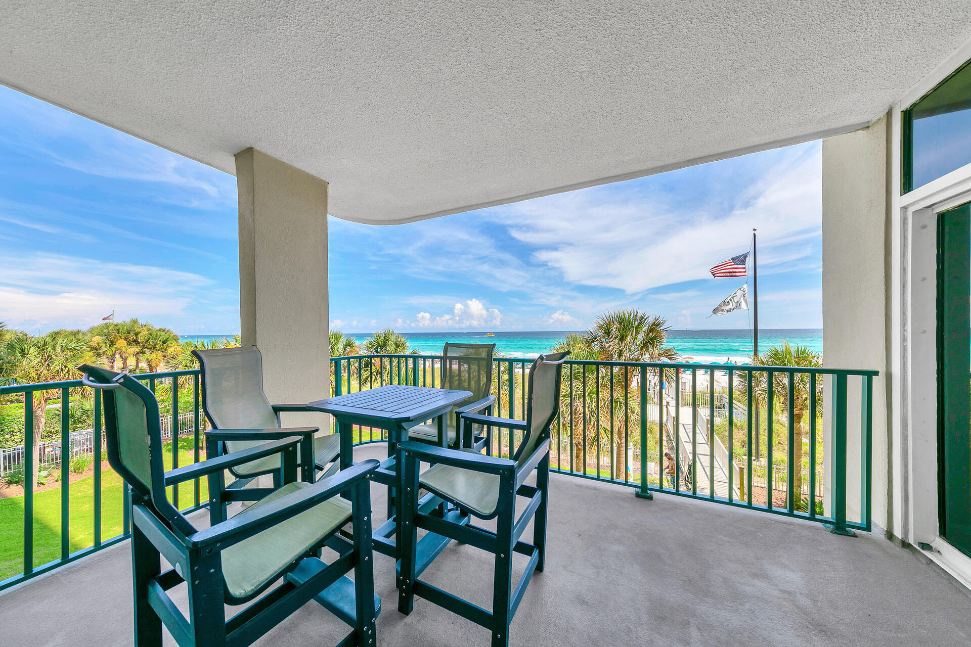 a balcony with chairs