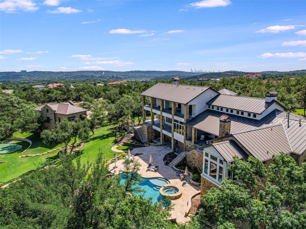 an aerial view of a house with a garden