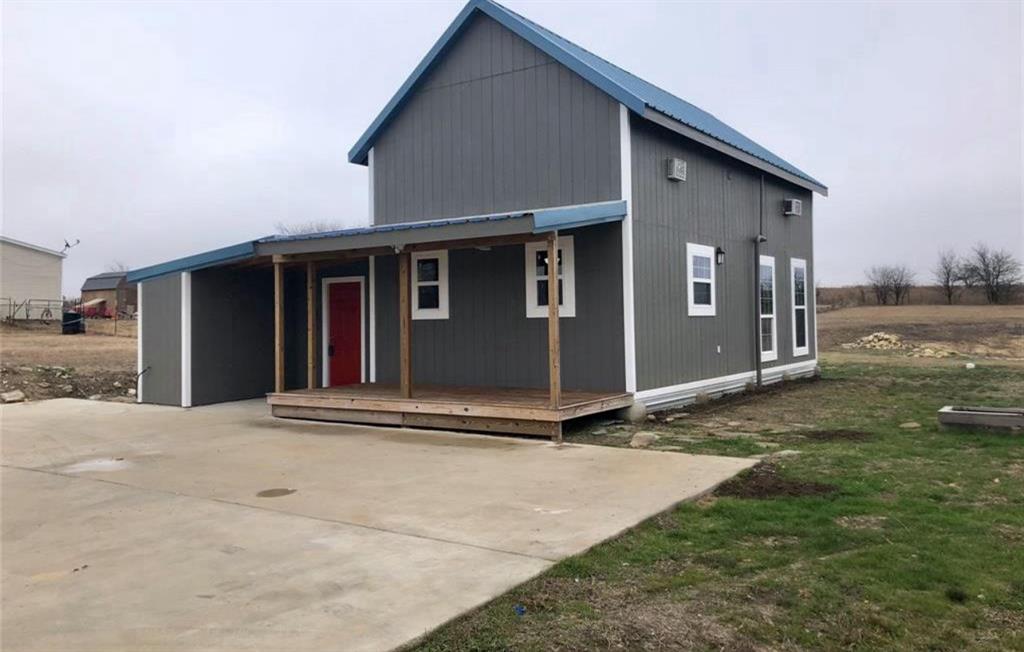 a front view of house with yard