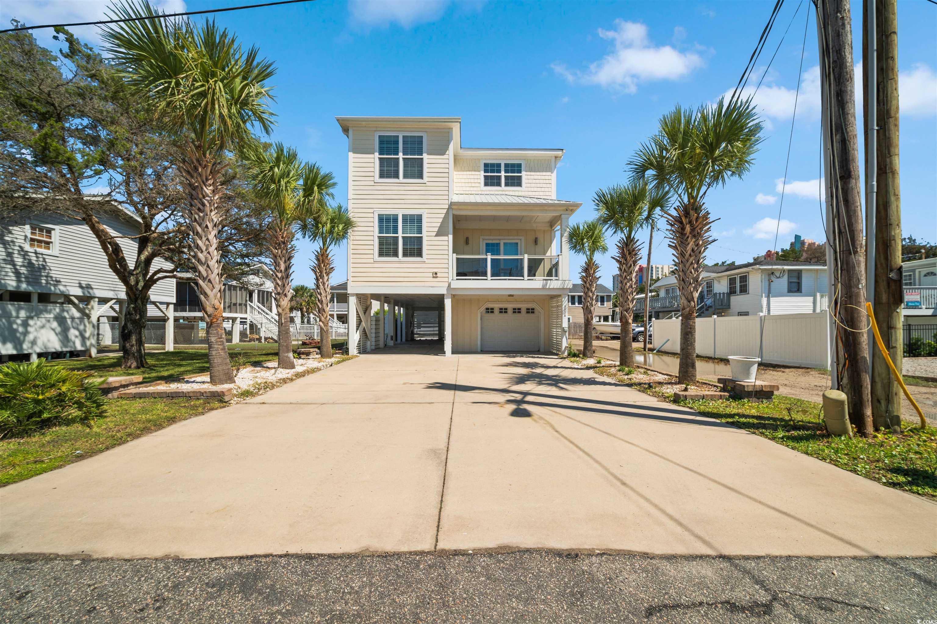 Coastal inspired home with a carport