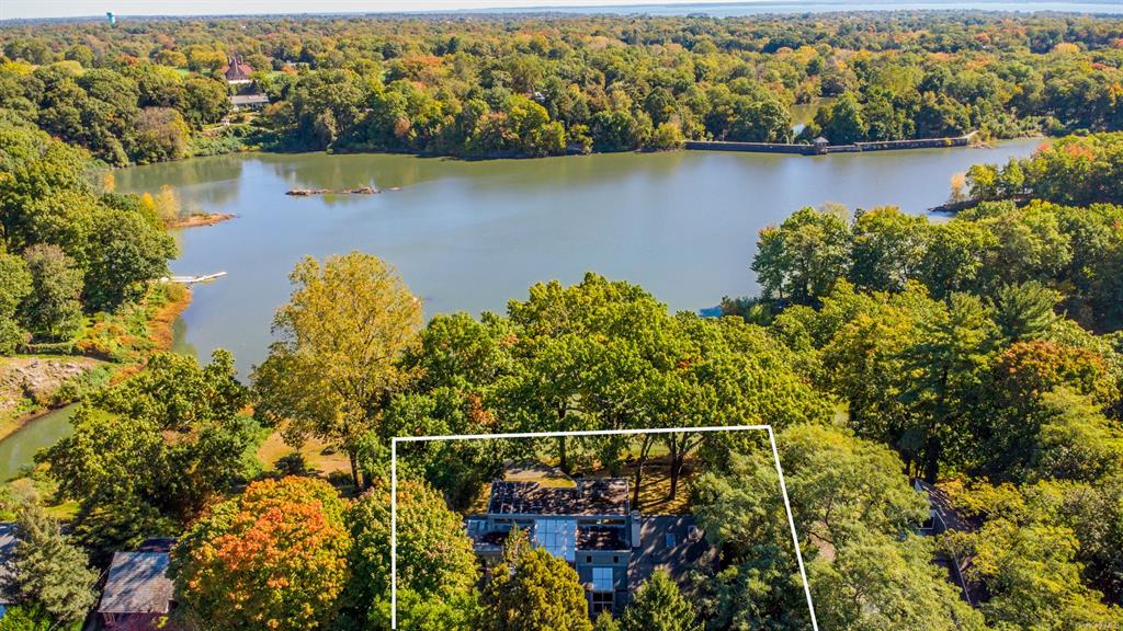 Birds eye view with a water view