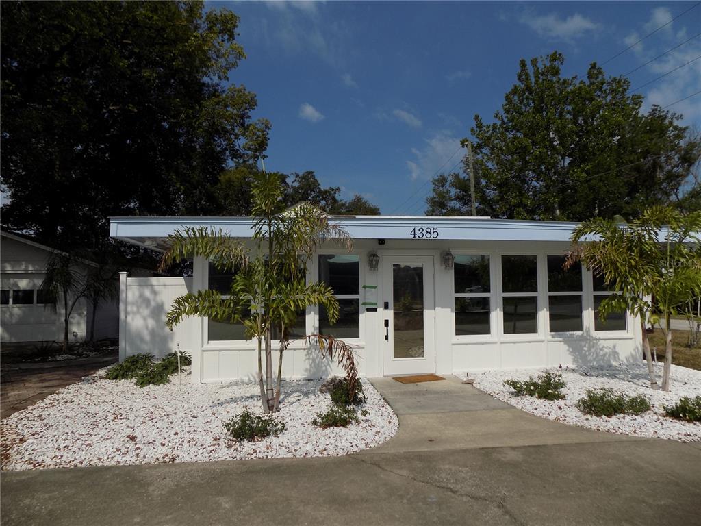 a front view of a house with a porch