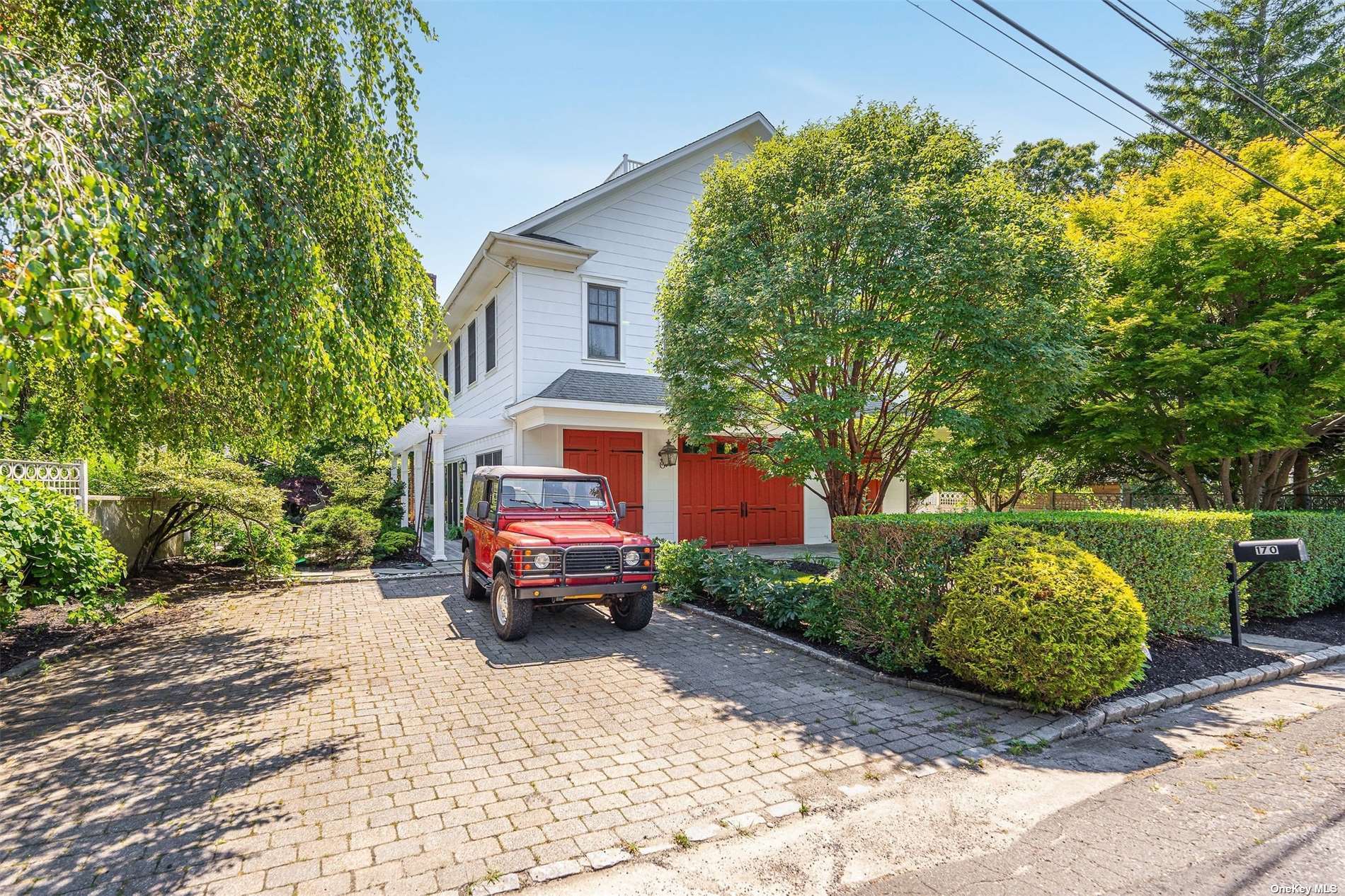 a car parked in front of a house