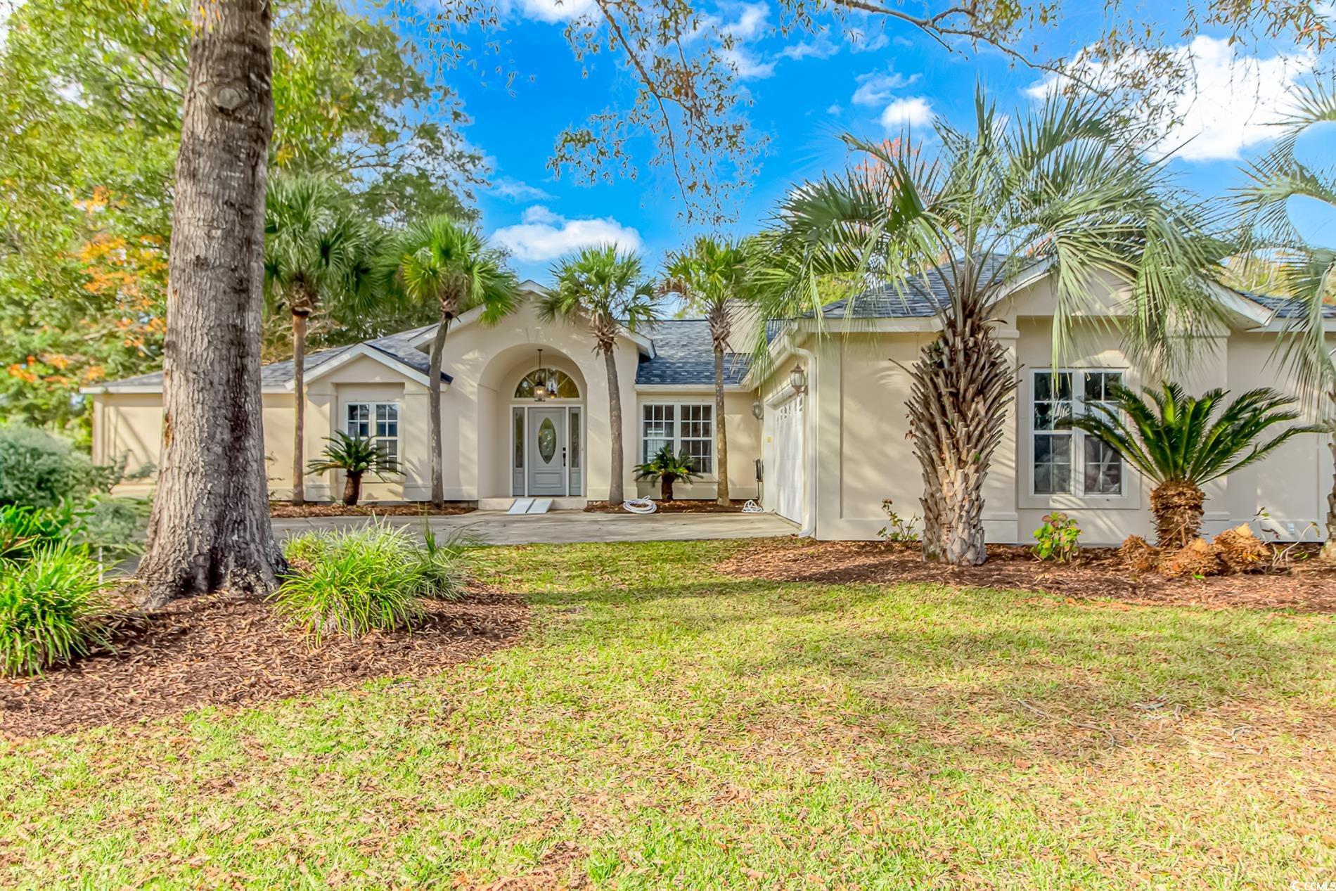 View of front of house with a front lawn