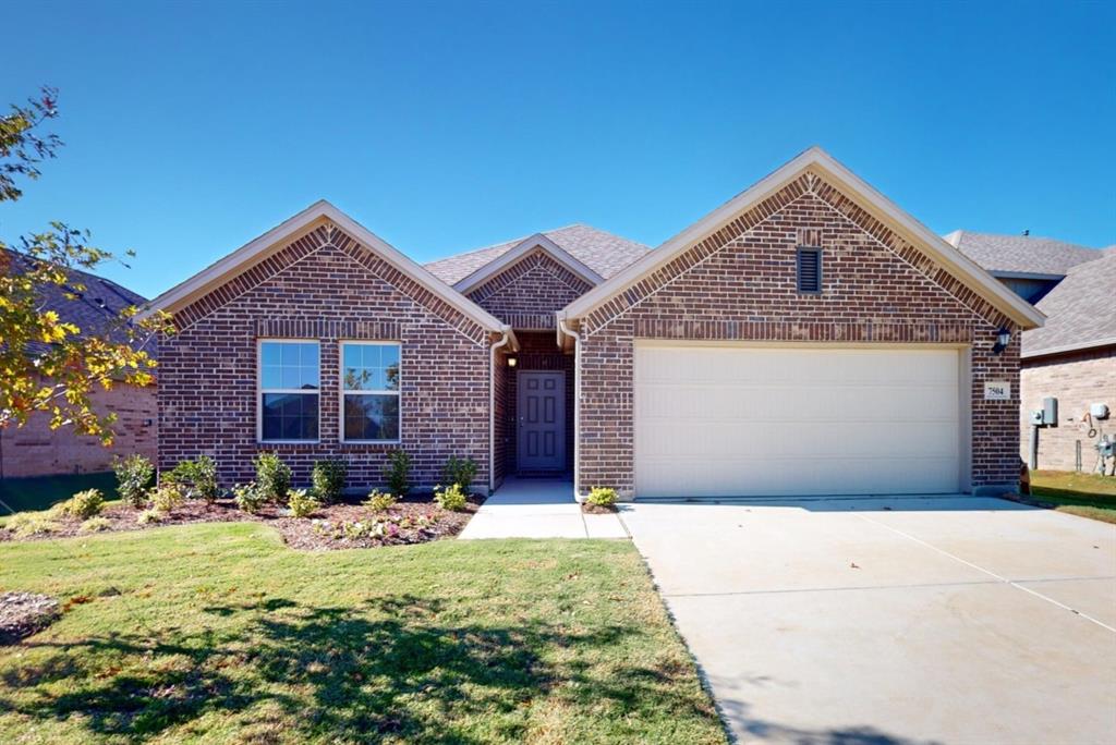 a front view of house with yard