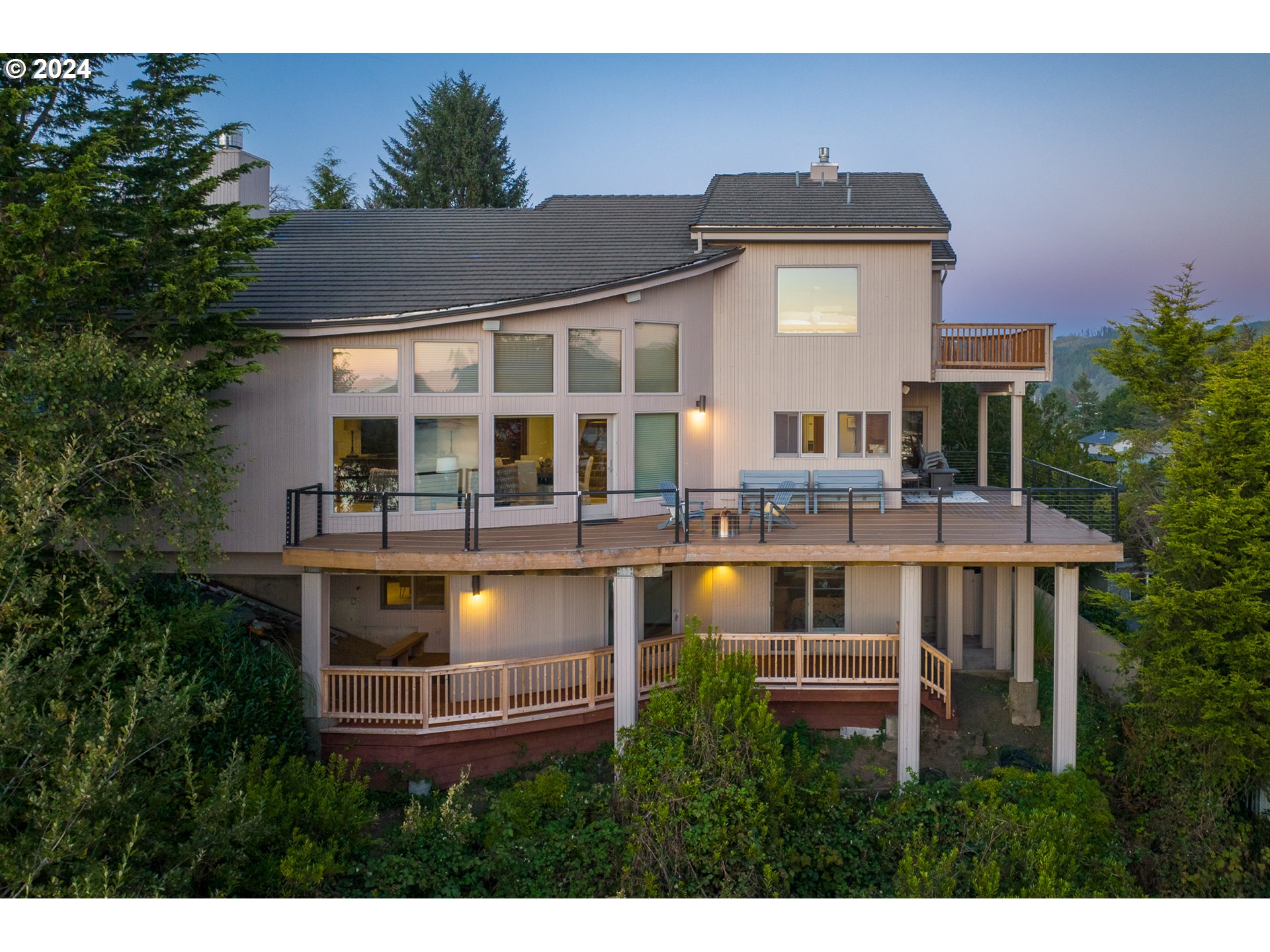 a aerial view of a house with a swimming pool