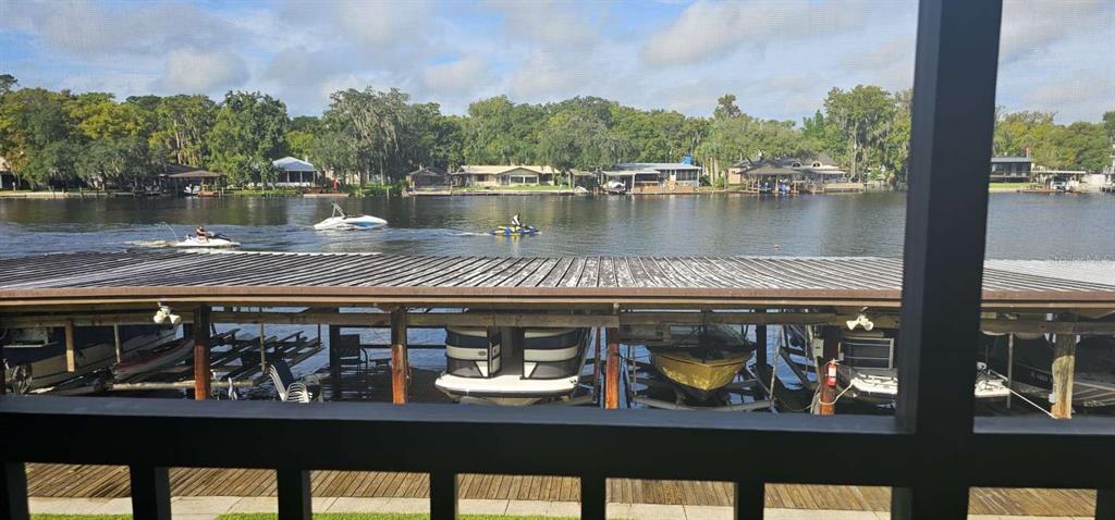 a view of a lake from a balcony