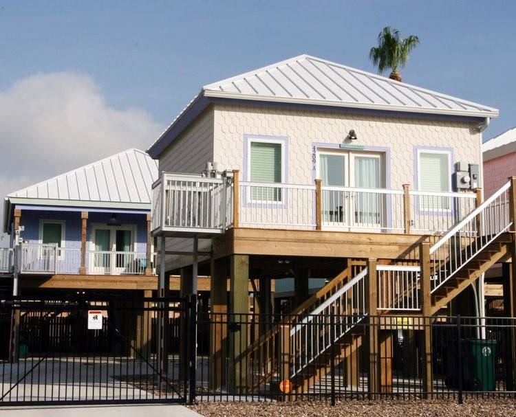 a front view of a house with a porch