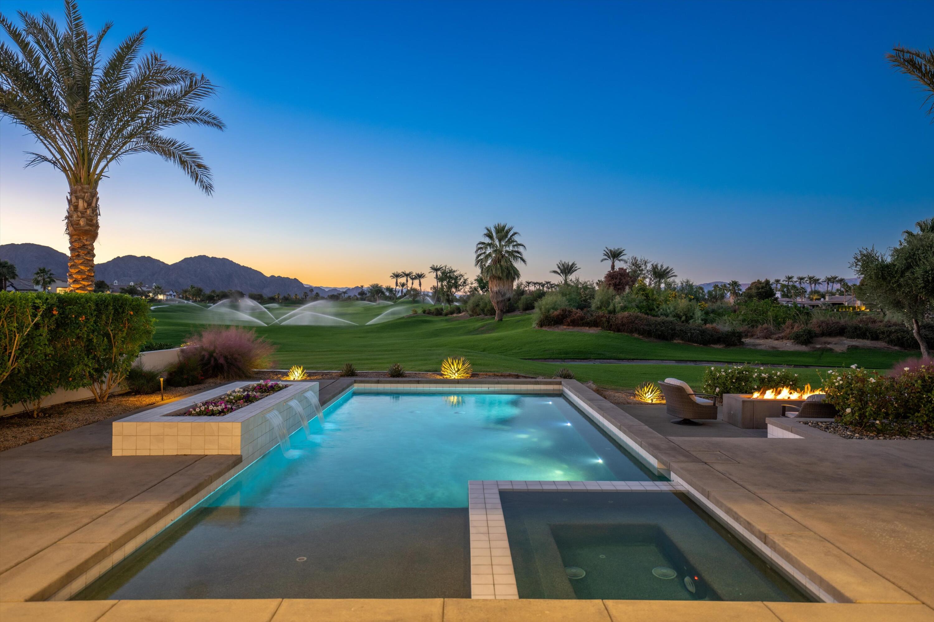 a view of swimming pool with a patio