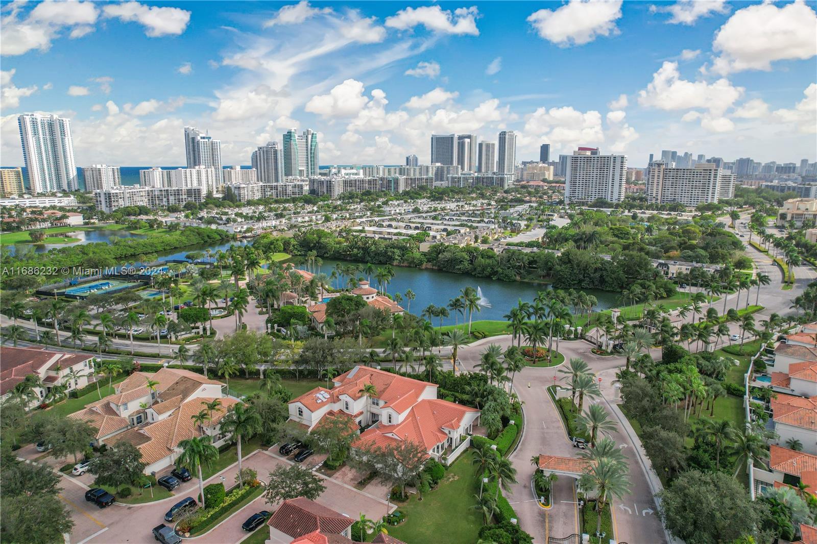 an aerial view of city and lake