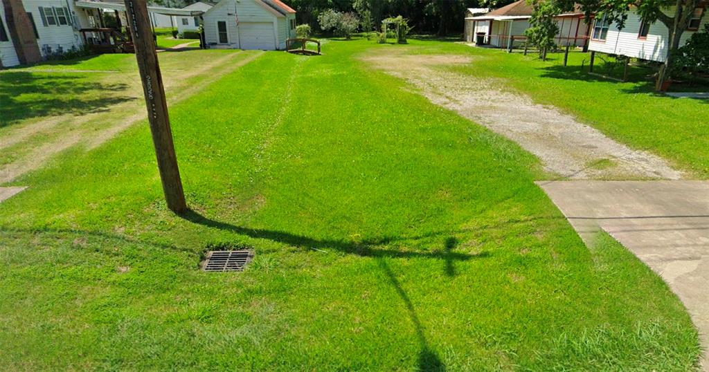 a view of a backyard with a garden