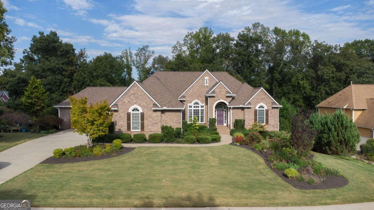 front view of a house with a yard