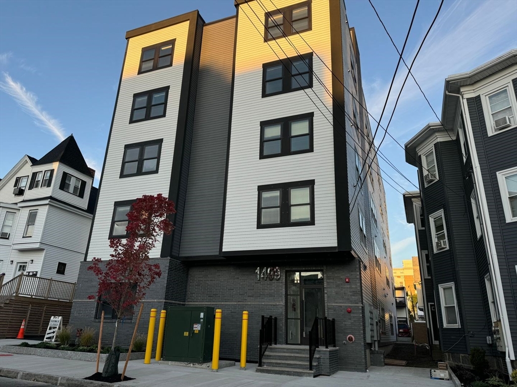 a view of a building with a street